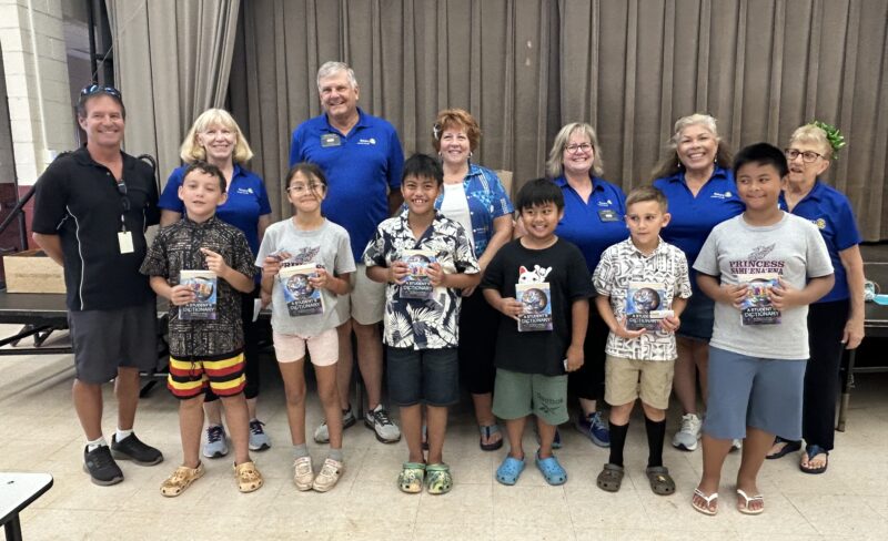 The Rotary Club of Lahaina Sunset presented dictionaries and other school supplies to the 100 third- and fifth-grade students at Princess Nahienaena School on O
